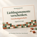 Digitaler Steinmomente-Geschenkgutschein per E-Mail. Produktillustration mit dem Schriftzug „Lieblingsmomente verschenken“ und glatten Mosaikfliesen.